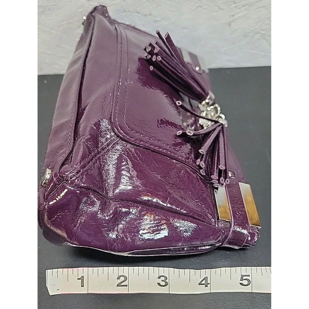 Victoria's Secret Cosmetic Bag Women Purple Vinyl Tasseled Clutch:‎ Bag only